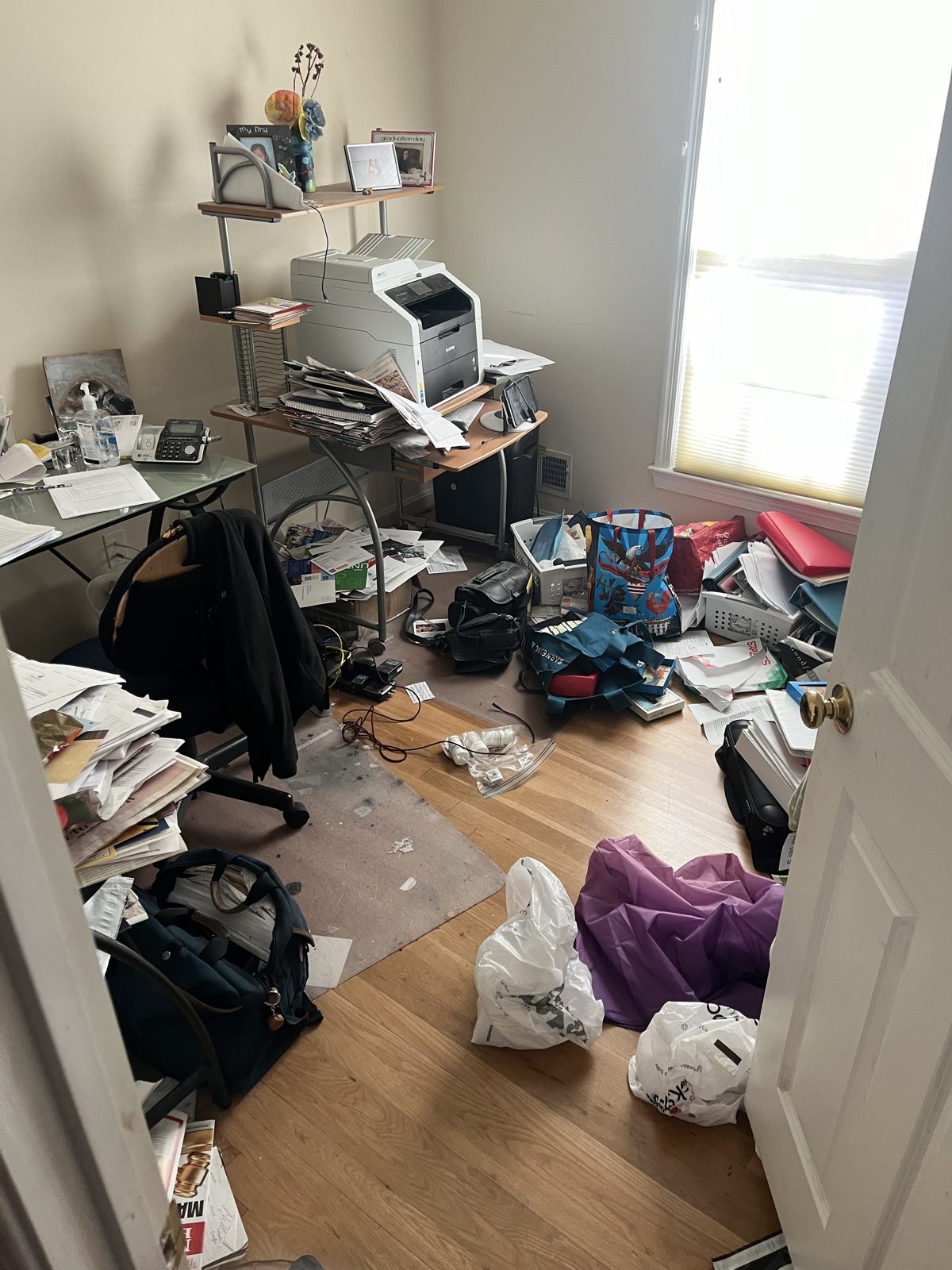 Cluttered home office before renovation